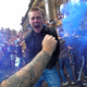 Raucous fans of Leeds United celebrate the team’s promotion to the Premier League.